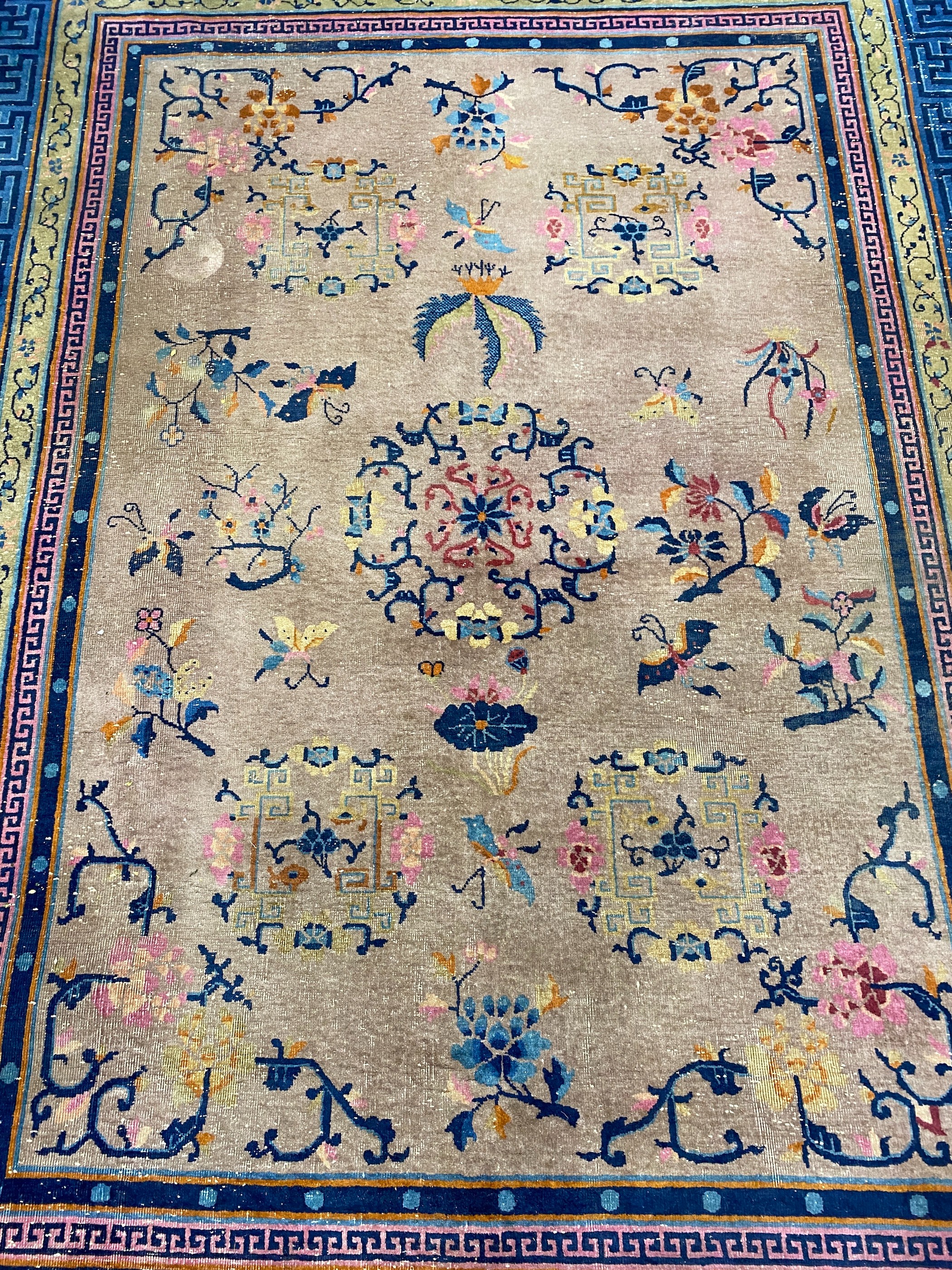 An early 20th century Chinese lilac ground carpet, 330 x 240cm
